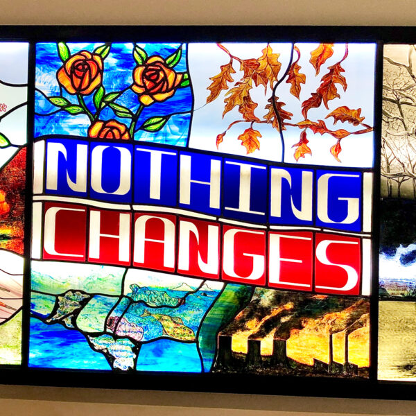 'Nothing Changes' in a backlit panel